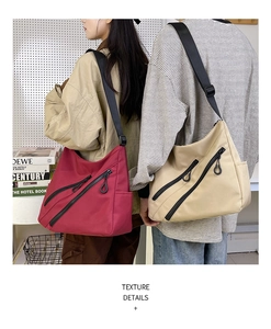 Détails de grands sacs messagers en toile rouge et blanc cassé avec bretelles réglables