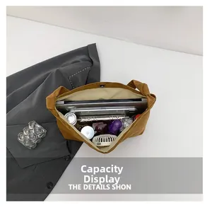 Top view of spacious brown corduroy tote bag showing large capacity for laptop and daily items