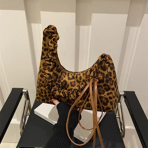 Vintage leopard print tote bag with ruffled handles and adjustable shoulder strap