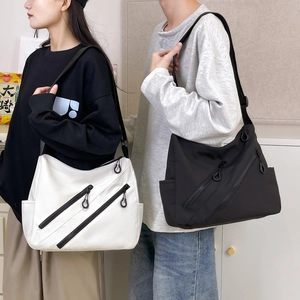 Sac messager minimaliste en nylon à grande capacité avec bandoulière réglable pour femme