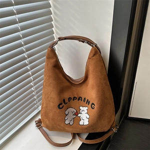 Brown faux suede tote bag with cute puppy embroidery and adjustable shoulder strap
