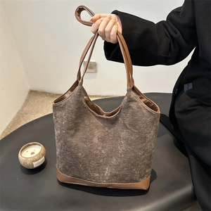 Retro canvas and brown leather tote bag for women showing a large capacity casual style