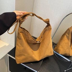 Caramel frosted suede tote bag with stylish knotted shoulder strap for women