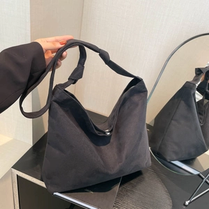 Classic black frosted matte tote bag with knotted shoulder strap for women daily use