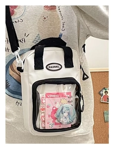 Detailed view of white ita bag with transparent PVC window for badge display