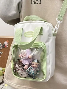 Mini transparent crossbody bag in white and green for badge and plush doll storage
