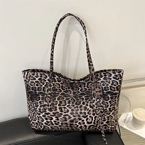Chic leopard print large tote bag with brown leather straps for daily commute and shopping