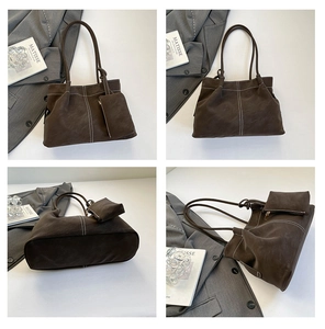 Detail of dark brown faux suede tote bag set with white contrast stitching and pouch