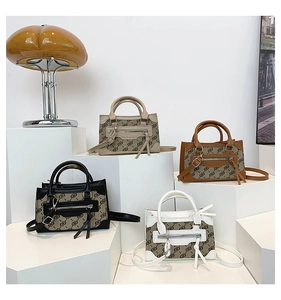 Detailed display of four color options for the stylish monogram crossbody handbag