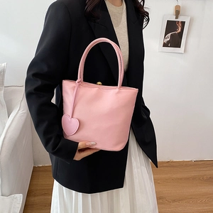 Pink nylon mini tote bag for women with heart pendant and metallic buckle detail