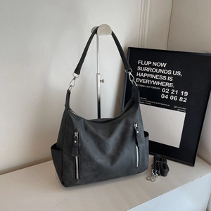 Black large capacity matte tote bag with dual front zippers and adjustable shoulder strap