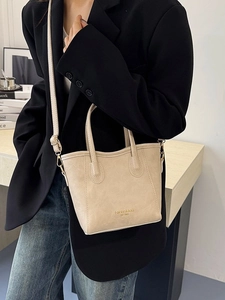 French style beige bucket tote bag with top handles and adjustable strap for women