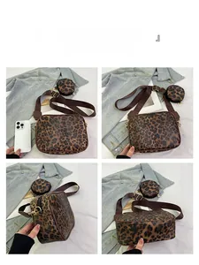 Detail view of leopard print crossbody bag set with small round coin purse and wide strap