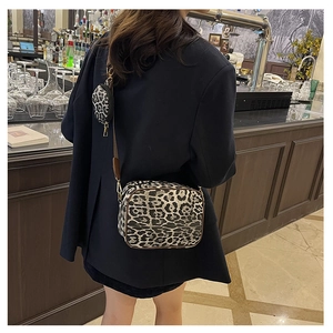 Chic leopard print crossbody camera bag set with a mini round coin purse and gold hardware
