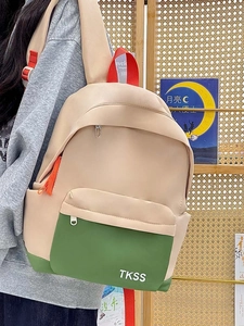 Detail view of contrast stitching school backpack with durable TKSS webbing handle