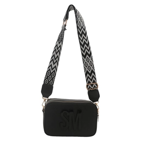 Chic black camera bag with SM logo and wide geometric strap in a modern minimalist style