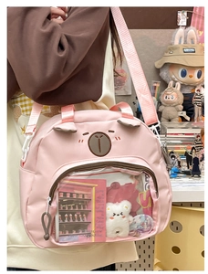 Pink cartoon shoulder bag with transparent PVC pocket and cute bear embroidery detail