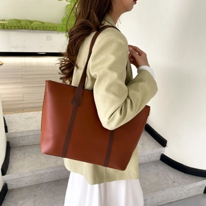 Minimalist large capacity dark brown leather tote bag with stylish vertical contrast straps