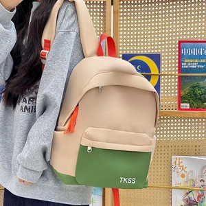 Casual color-block backpack in beige and forest green for students and travel use