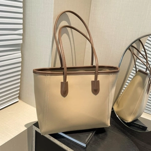 Minimalist beige tote bag with brown handles, perfect for office and daily commuting