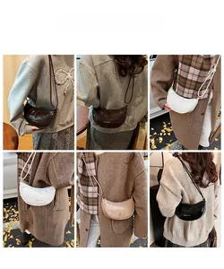 Detail view of crescent crossbody bags in multiple colors with fashion logo lettering