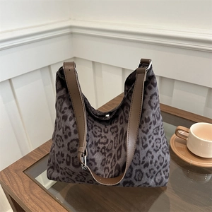 Leopard print hobo tote bag with adjustable brown leather strap for casual autumn fashion
