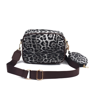Leopard print crossbody camera bag with adjustable wide strap and matching round coin purse