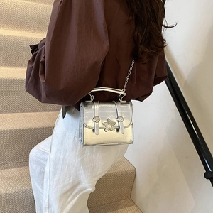 Silver metallic laser handbag with star detail and chain strap for women fashion