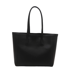 Minimalist black faux leather tote bag with long shoulder straps for women commuting