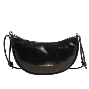 Glossy black crescent shoulder bag with gold zipper and Fashion & Bags text on white background
