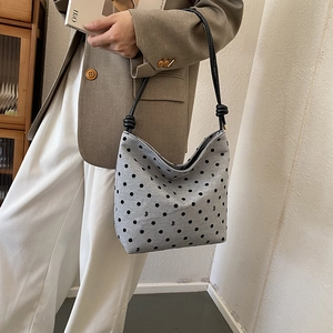 Gray canvas polka dot tote bag with knotted rope straps for stylish commute fashion