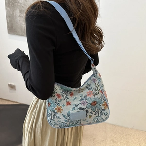 Floral embroidered light blue canvas shoulder bag with wide strap for casual chic women
