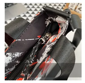 Detail shot of smooth silver zipper and graffiti pattern on a large oxford tote bag
