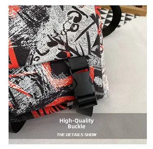 Detail showing the high-quality black plastic buckle and colorful graffiti on canvas bag