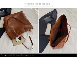 Detail view of large brown crocodile pattern tote bag interior and capacity storage
