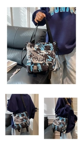 Detail of graffiti print oxford tote bag with buckle flap pocket and adjustable strap