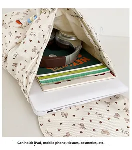 Interior view of beige corduroy backpack showing space for iPad and daily essentials