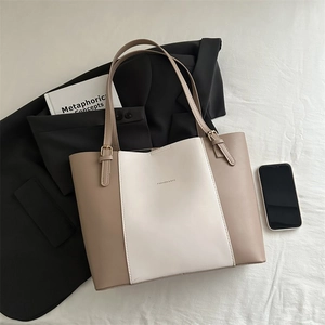 Detail view of large tote bag with two-tone stitching and Fashion & Bag lettering