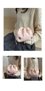 Detail of soft pink quilted drawstring bag with bow embroidery and fluffy texture