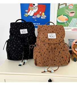 Corduroy backpacks with ribbon pattern featuring cartoon embroidery and beaded charms