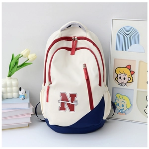 Close-up of stylish large capacity travel backpack with creative N logo and red zip accents