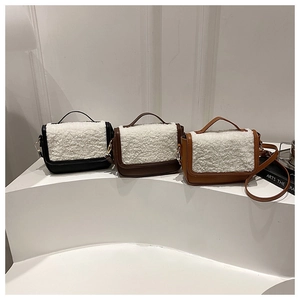 Minimalist faux fur and leather crossbody bags shown in black, dark brown, and light brown