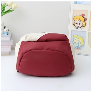 Detailed back view of a red and white large travel backpack for students and leisure use