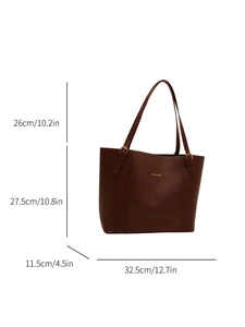 Detailed dimensions of the brown leather tote bag showing strap height and body size