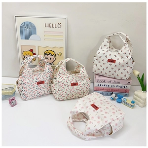 Set of four floral canvas bento lunch bags featuring stylish small flower prints