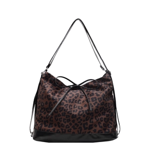 Leopard print canvas tote bag with black faux leather trim and bow accent for women