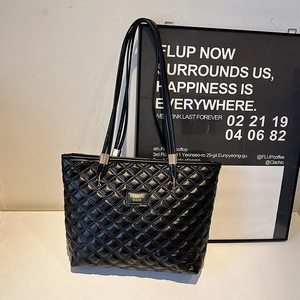 Large black quilted tote bag with shiny PU leather finish and dual shoulder straps