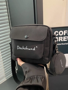 Chic black canvas crossbody bag for women featuring a Dachshund print and round coin purse