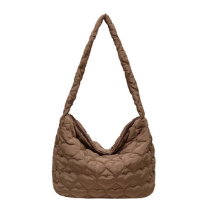 Large heart quilted tote bag in chocolate brown nylon fabric with a shoulder strap