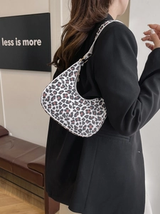 Chic leopard print crescent shoulder bag for women made of premium felt material